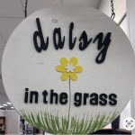 Daisy In The Grass logo